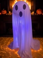 Close-up of glowing purple LED ghost ornament with detailed spooky face for Halloween decor - White Blue Light (YL-09)