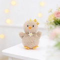 Ciondolo pulcino pasquale di peluche kaki con fiocco giallo e decorazione a margherita - Cuoio