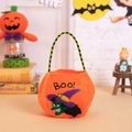 Halloween Süßigkeitentasche in Orange mit Hexe und grün gestreiftem Griff - Oranger Hexenstil