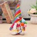 Rainbow themed female gnome plush doll with colorful striped hat and braided hair - Female With Balloon (W-QT68)