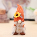 Standing harvest gnome with orange pointed hat, sunflowers and white braids decoration - Dotted Sunflower Braids Style (W-WS81)
