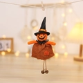 Hängende Halloween-Kürbis-Hexe aus Sackleinen mit Glockenbeinen als rustikale Deko - Kürbis Puppenanhänger