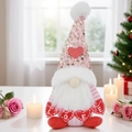 Detailed view of Valentine's gnome featuring pink sequin hat and LOVE heart sign - Male Style With Banner