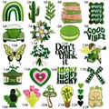 Detail view of 23 forest style floral embroidery patches in vibrant yellow-green tones - Assorted Patterns (Cartoon Forest Patch Combo)