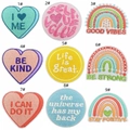 Detail showing nine colorful embroidered patches with rainbow and heart designs in a grid - Full Assortment of 9 Designs