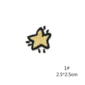 Detail of a 2.5cm gold star embroidered patch with black dripping effect and fine texture - Dripping Star Style (1#)