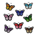 Detailed close-up showing eight colorful butterfly embroidery patches with vibrant textures - Butterfly Combination