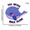 Purple whale embroidered patch with You Never Walk Alone lettering and closed eye design - YOU NEVER WALK ALONE Whale Style