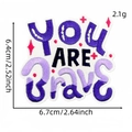 Purple embroidered patch featuring YOU ARE Brave lettering with red stars for clothing - YOU ARE Brave Style