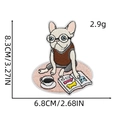 Detail of cartoon bulldog embroidery patch with precise dimensions 8.3x6.8 cm shown on white - Cozy Bulldog Reading (Style 5)