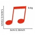 Macro detail of red musical note iron-on patch with size 6cm x 5.4cm and weight 0.6g - Red Eighth Note