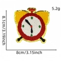 Detail view of alarm clock chenille patch with gold sequins and embroidery measurements - Study Patch 6#