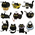 Close-up of 10 assorted black cat cartoon embroidery patches for clothing accessories - Black Cat Patch Set