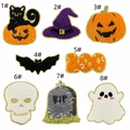 Detailed close-up of chenille Halloween patches featuring black cat, pumpkin, and ghost designs - Eight Piece Combination Style