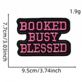 Embroidered iron-on patch with pink Booked Busy Blessed text on black fabric - Black Background Pink Letters (Booked)
