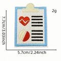 Embroidered medical clipboard patch with heart rate monitor and pill capsule design - Medical Clipboard