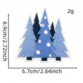 Blue embroidered pine trees patch with white snowflake details for winter apparel - Pine Tree