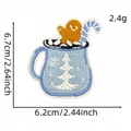 Blue Christmas mug embroidery patch with gingerbread man and size dimensions shown - Gingerbread Coffee Cup
