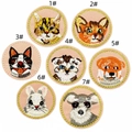 Detail view showing seven cute embroidered cat and dog animal patches with golden borders - Cartoon Animal Patch Combo