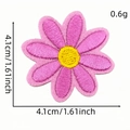 Pink daisy flower embroidered patch with yellow center and 4.1cm size measurement - Flower Patch Style 27