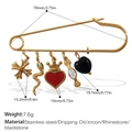 Spilla a balia dorata con ciondoli retrò a forma di cuore e serpente su bianco - Stile Croce E Serpente (BZ04CRG)