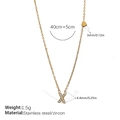Gold stainless steel necklace with zircon-studded letter X and a small heart charm - Letter X Style (XL543WEGX)