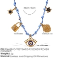 Braided nautical necklace with blue and white cord featuring five gold charms and evil eye - Sun Moon Lock Evil Eye Heart Necklace (XL785BEG5)