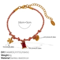 Pink braided steel bracelet with 18K gold starfish, red zircon and heart charms - Starfish Red Zircon Heart Bracelet (SL385PKG10)