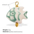 White ceramic fish pendant with green pattern and 18K gold plated stainless steel - White and Green Patterned Ceramic Fish Pendant (PJ712CRG)