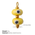 Golden stainless steel evil eye charm with yellow ceramic beads and oval design detail - Evil Eye Bright Yellow Style (PJ1014YWG)