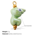 Pale green ceramic eye charm pendant with gold metal accents for DIY jewelry making - 23.7mm / Light Green Eye Style (PJ1176GNG)