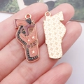 Pink cowboy holster pistol charm with star pattern and gold textured back for DIY jewelry - Brown Enamel Pistol (25017)