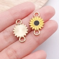 Close-up of double-loop sunflower charms showing front yellow enamel and back texture - Yellow Double Loop Sunflower Daisy