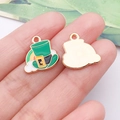 Macro detail of St. Patrick's Day green hat and rainbow enamel charm with gold texture - Green Irish Rainbow Hat (25110)