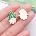 Detail of a green St. Patrick's Day gnome charm with a golden clover pattern on the back - Green Irish Shamrock Gnome (25118)