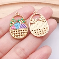 Macro view of colorful enamel Easter egg basket pendants with gold honeycomb back texture - Blue Egg Flower Basket (23088)