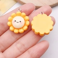 Detailed close-up of resin sunflower pendant showing both front and flat back sides - Yellow Sunflower Smiley (24782)