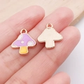 Purple mushroom charm for DIY jewelry making shown in a hand with golden metal finish - Purple Enamel Mushroom (14x16mm) / Purple