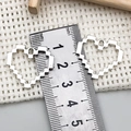 Juego de dos colgantes de corazón pixelados plateados con anillas para joyería DIY - Estilo de Corazón de Mosaico Hueco (18635)