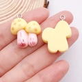 DIY resin double mushroom pendant with yellow spotted caps and pink stems for jewelry - Yellow Play Food Mushroom (24775)