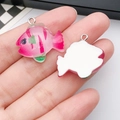 Detail of pink resin cartoon fish pendant with stripes and silver metal jump ring - Rose Pink Fish (24758)