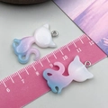 Close-up of cat-shaped resin charms with glitter gradient and measurement scale - 30x20x4mm / Purple Blue Resin Glitter Gradient Cat