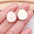 Pink enamel Easter egg charm with daisy pattern on golden alloy base for DIY jewelry - Pink Flower Egg (25124)