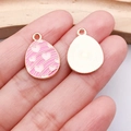 Pink heart enamel Easter egg charms with gold back and decorative metal texture - Pink Purple Heart Egg (25125)
