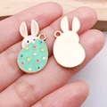 Easter bunny and colorful egg pendant charm with gold edge and green polka dots - Green Rabbit Spotted Egg (25139)
