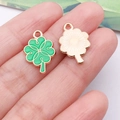 Green enamel four-leaf clover charms with gold trim and sunburst pattern on back - Green Irish Four-leaf Clover (25096)