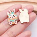 Enamel Easter bunny pendant with colorful wave pattern and golden back for jewelry making - White Rabbit Egg (25143)