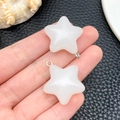 Detailed macro shot of luminous resin star charms with silver hooks for DIY jewelry - White Luminous Star (24062)