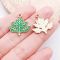 Green enamel maple leaf pendant with golden veins and textured metallic back for DIY jewelry - Green Leaf Maple Leaf (23035)