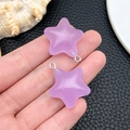 Detailed macro view of purple resin star pendants with silver metal jump rings - Purple Luminous Star (24061)